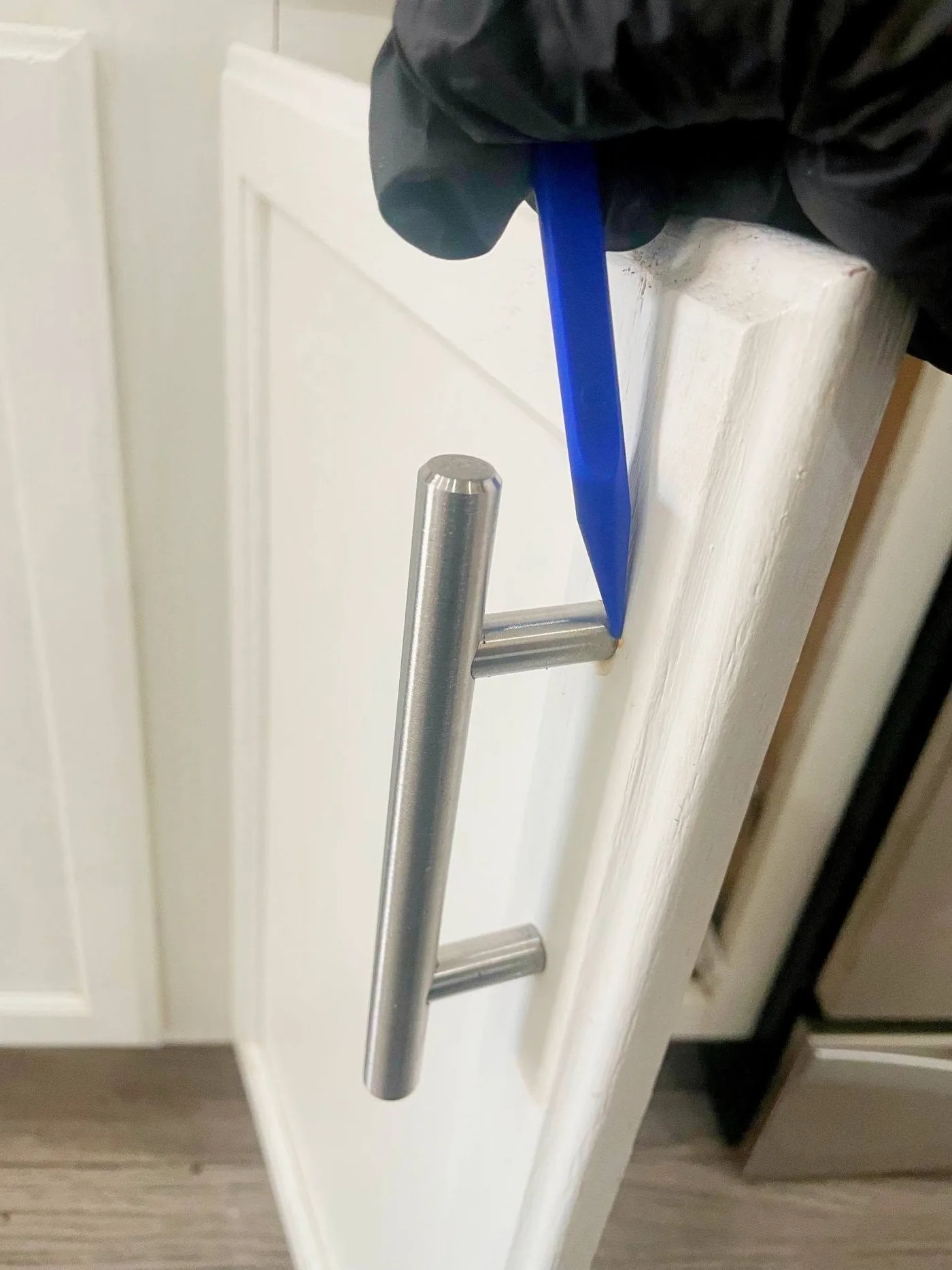 Cabinet handle detail being cleaned