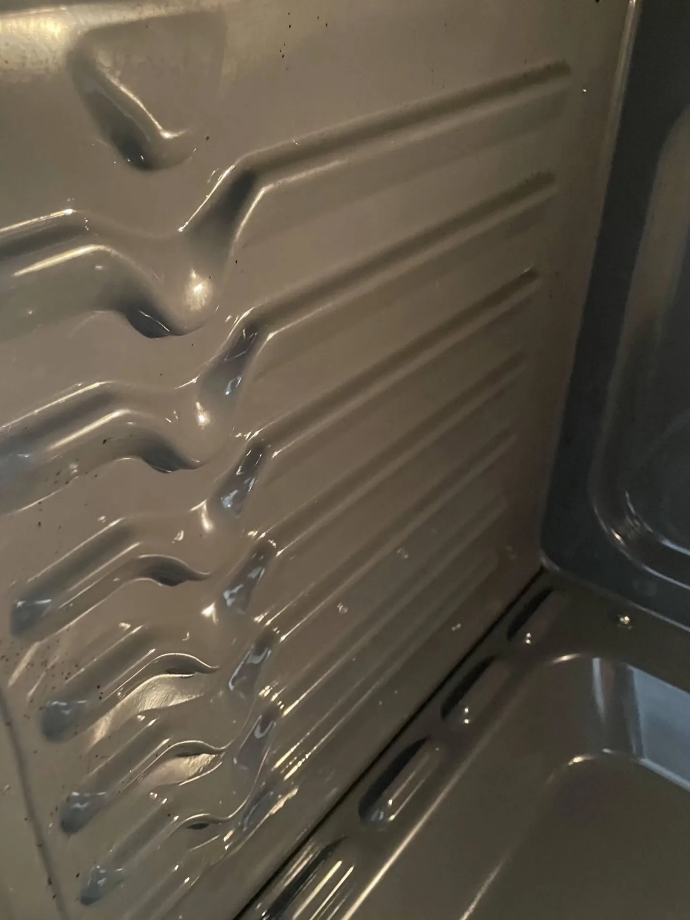 Appliance crevice before detailed cleaning