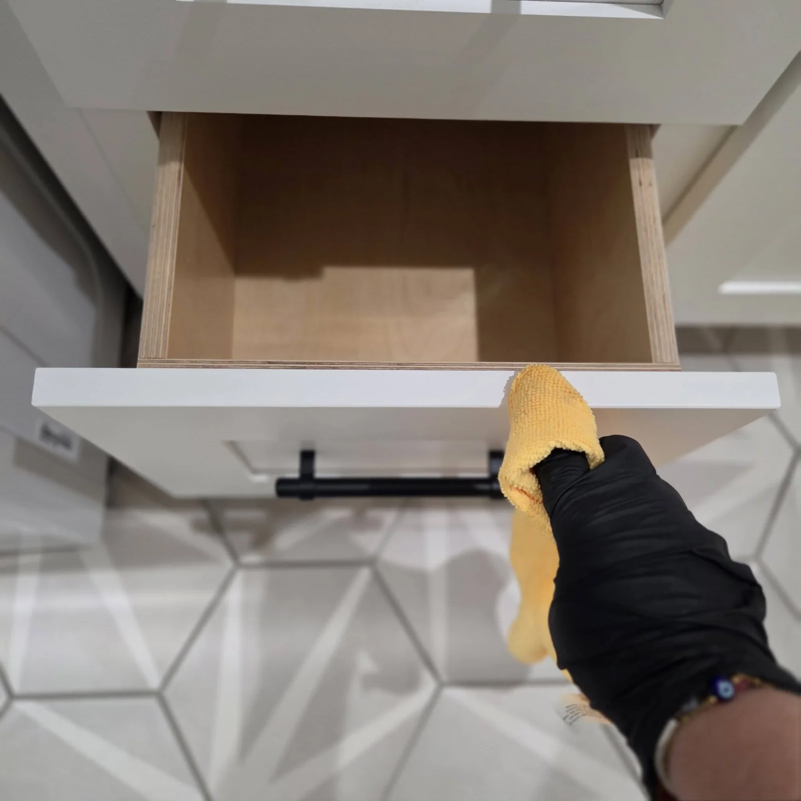 Cleaning the inside edge and front of a drawer