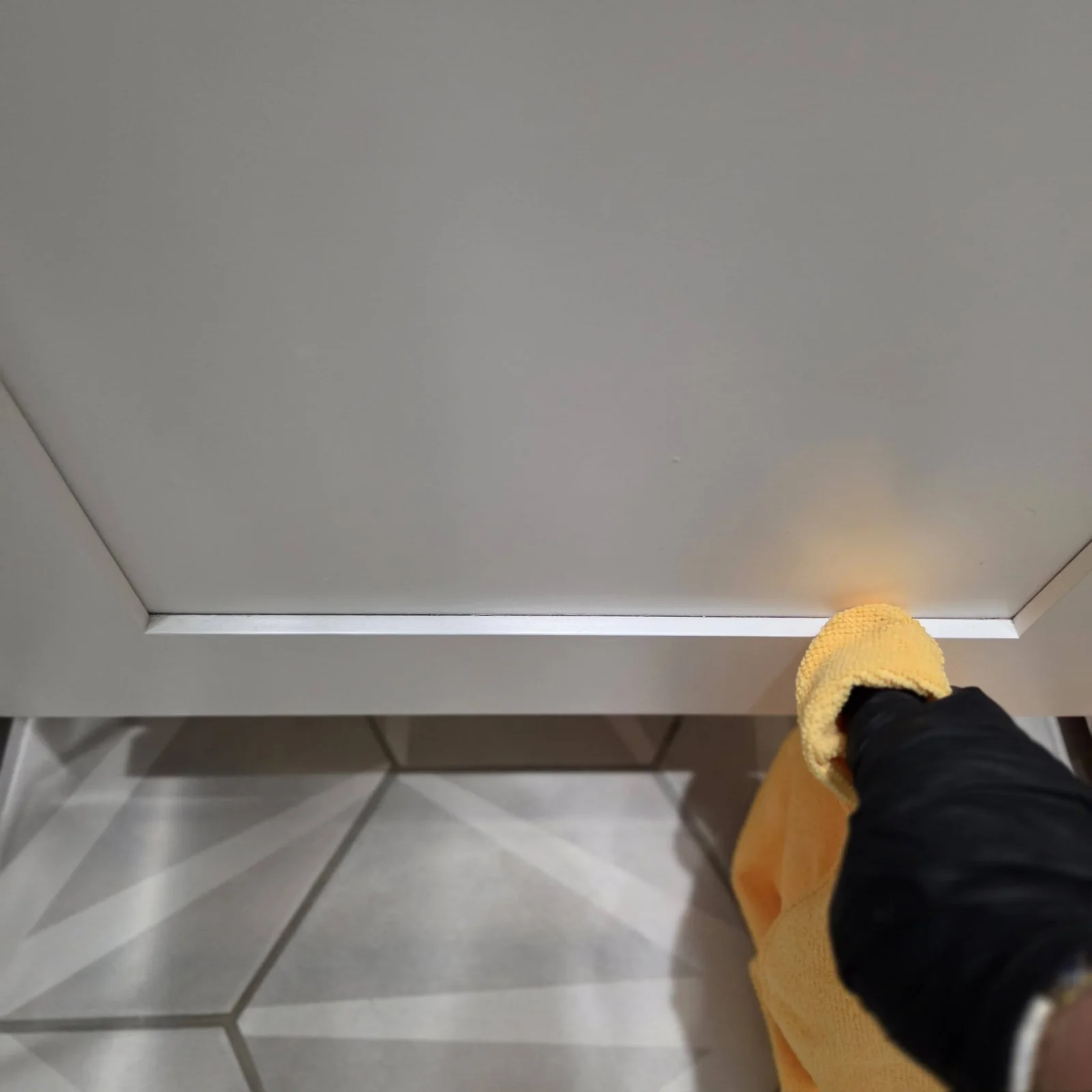 Bloom and Broom detailing a kitchen drawer edge