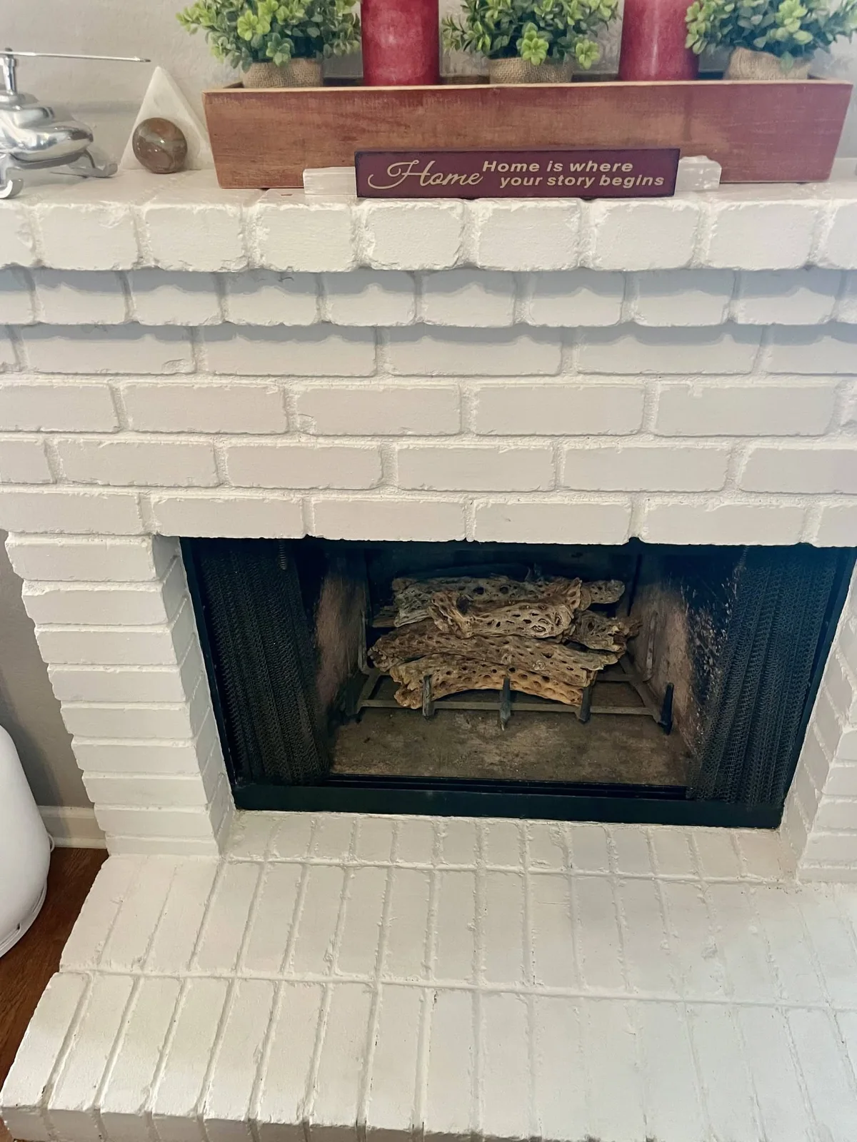 White painted brick fireplace detail work