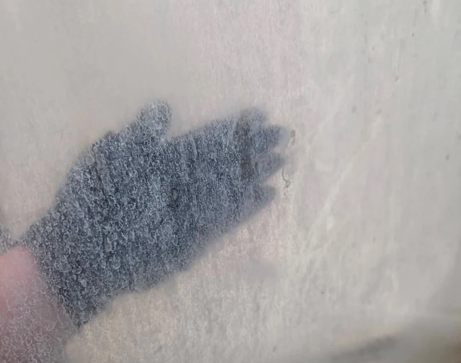 Cloudy shower glass before Bloom & Broom detail cleaning